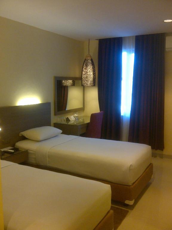 Amans Hotel Ambon Camera foto